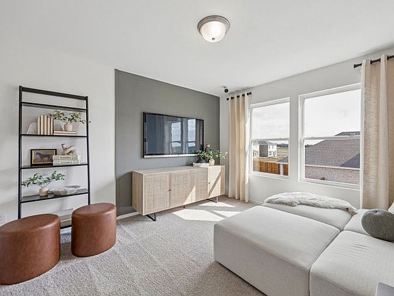 Loft on second floor with large windows