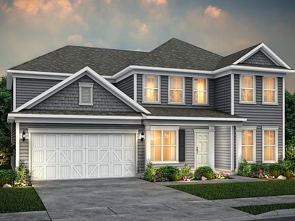 Wingate exterior 52 features siding, shakes, covered front porch, and 2 car garage