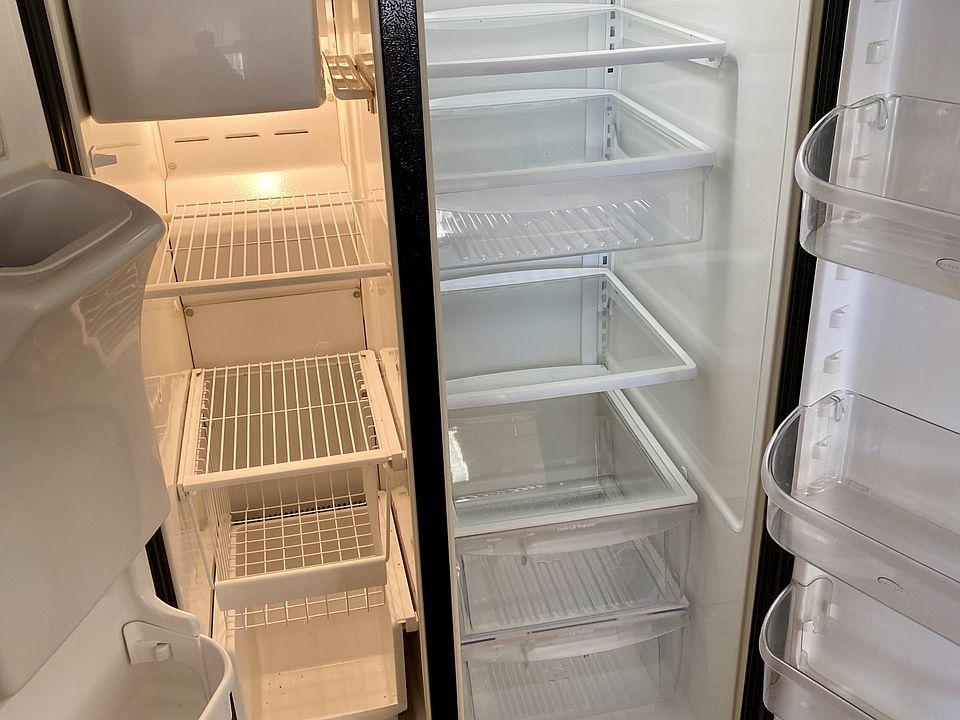 Side by side fridge and freezer