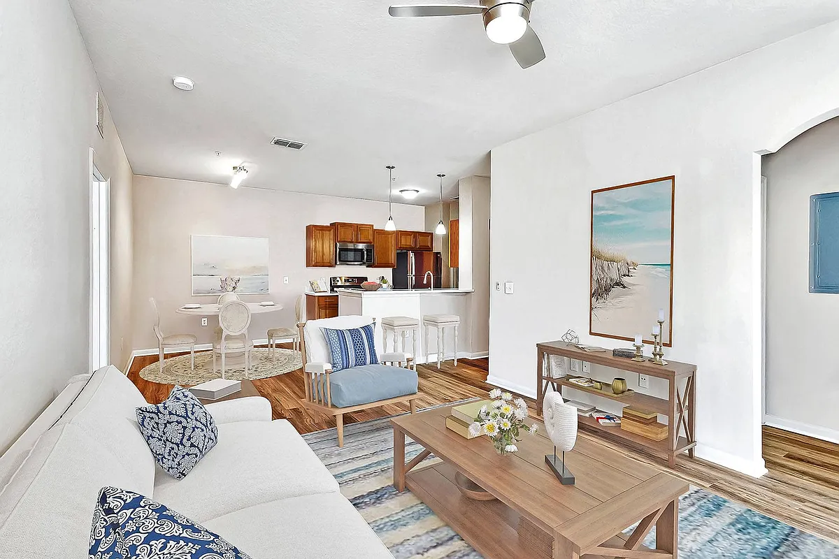 Living Room with Wood-Style Flooring - Grandeville on Saxon