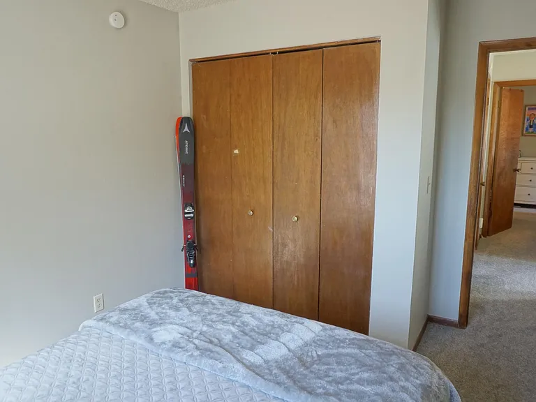 2nd bedroom closet and looking out into the hallway