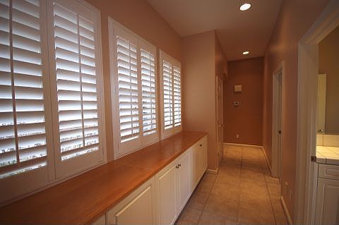 This isn't just a hallway: lots of cabinets &amp; courtyard view