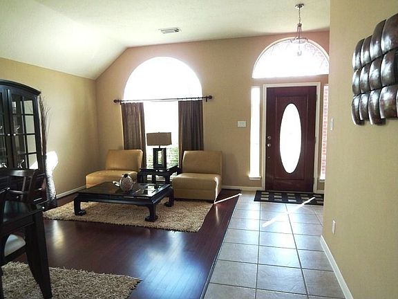 ENTRY, LIVING AND DINING ROOM