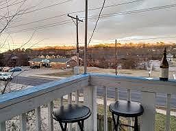 Private balcony overlooking Razorback Greenway, Nature and Bike Trail in the background.