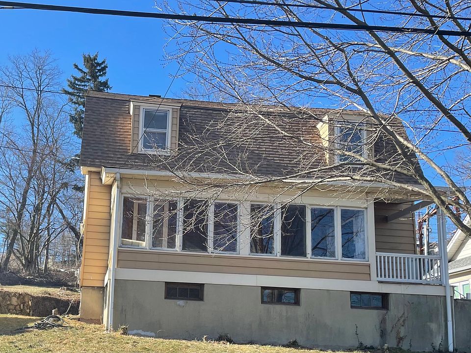 Charming single-family home with classic architecture and a large private backyard, located in a sought-after Summit neighborhood.