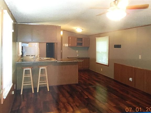 Living room view towards kitchen