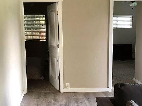 Living room view to the first 2 bedrooms -master to the left