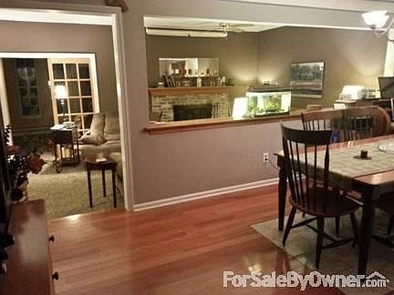 Open floor plan Dining Room : Hardwood & Marble Floor / open to Living room
