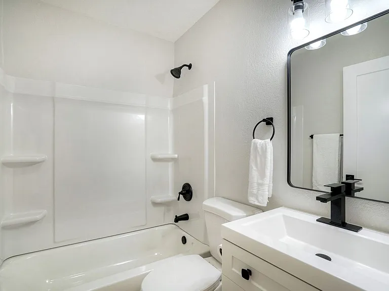 Modern bathroom with black fixtures