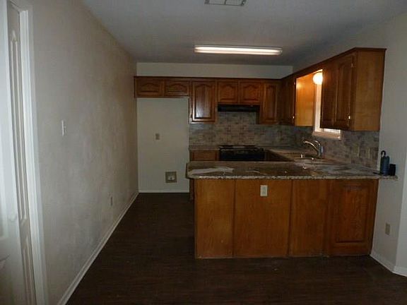 5th image of 7325 Western Plains Ave
