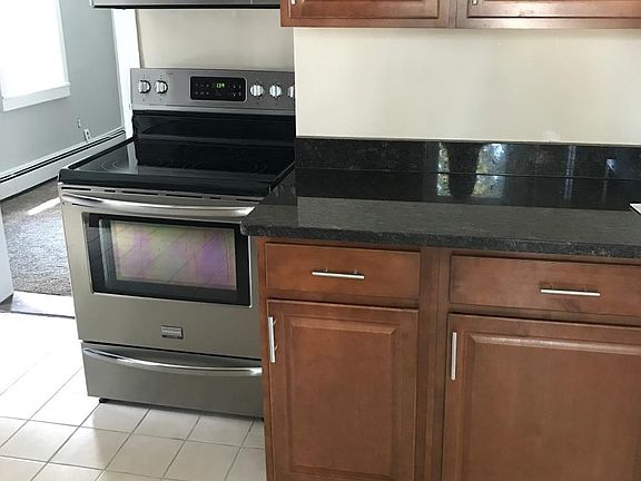 Kitchen with granite and stainless appliances