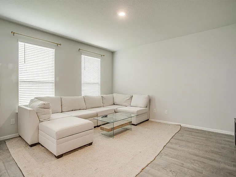 Spacious living area at the back of the house.