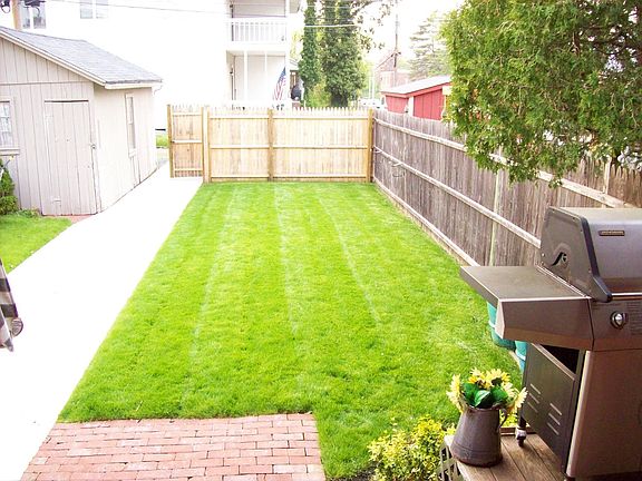 New sidewalk, fence, yard