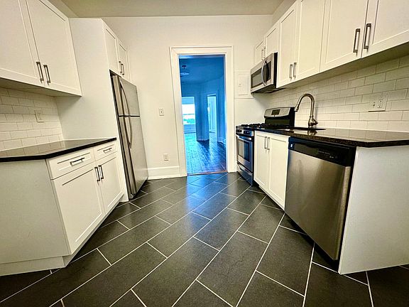 2nd image of 8643 E Jefferson Ave #4B