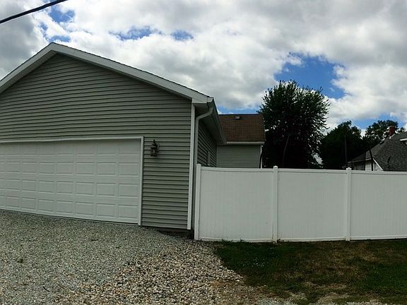 Back of detached garage facing alley