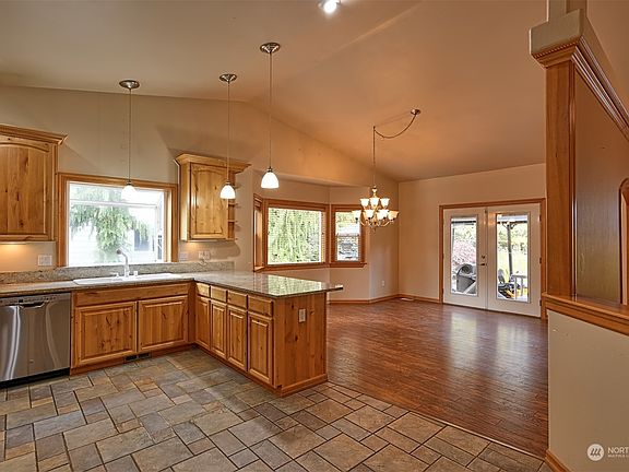 From the kitchen you can see the large dining room in the background>