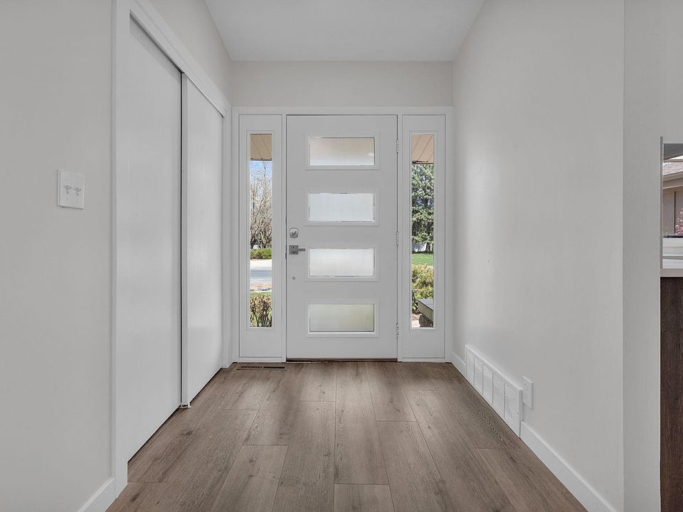 Newly renovated three bedroom, two bath on main floor living is light, bright and modern. It has high ceilings, large picture windows and a new kitchen.