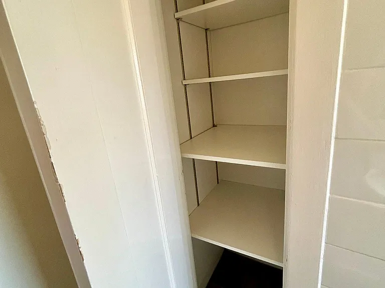 Closet inside bathroom