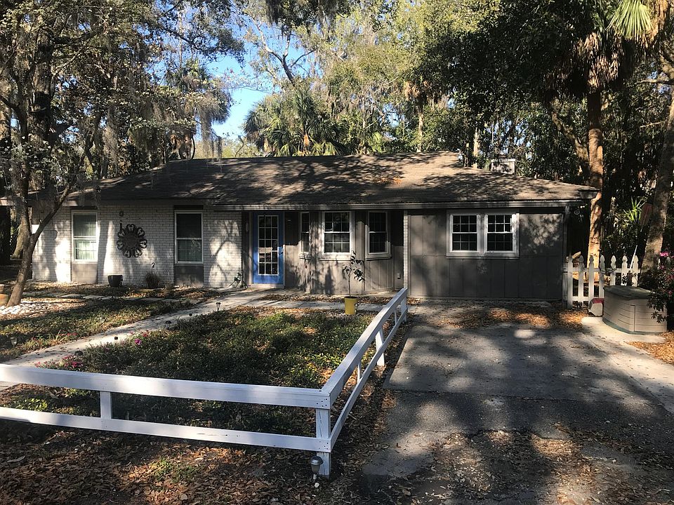 no grass, all groundcover. driveway on right