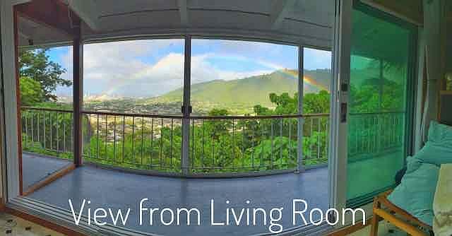 Open wall with screened in lanai connected to living room