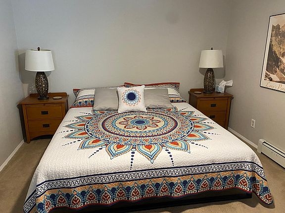 Master bedroom with king size bed.