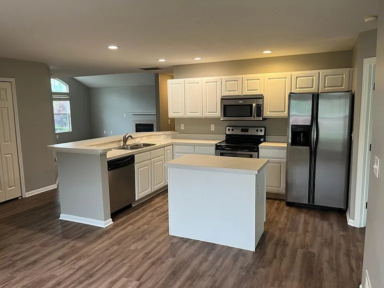 New floor thru entire condo