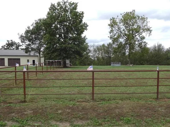 497 SE Rattle Snake Hl, Butler, MO 64730