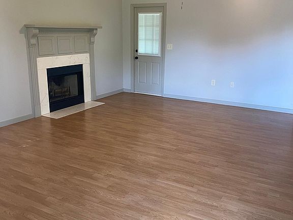 Large living room with high vaulted ceilings.
