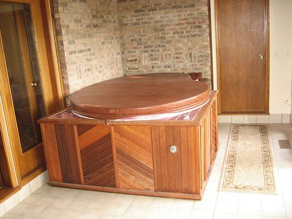 Hot tub in Sun Room