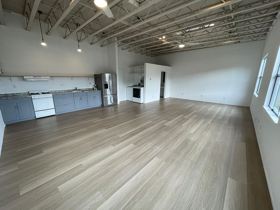 Corner of the studio view! Front door is in-between the dryer/fridge