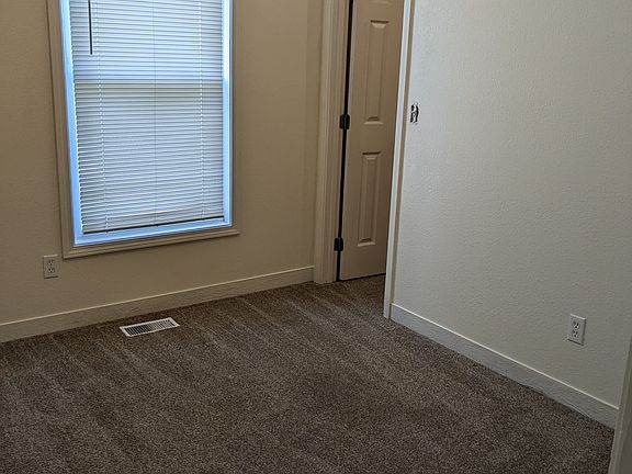 Upstairs bedroom with walk-in closet