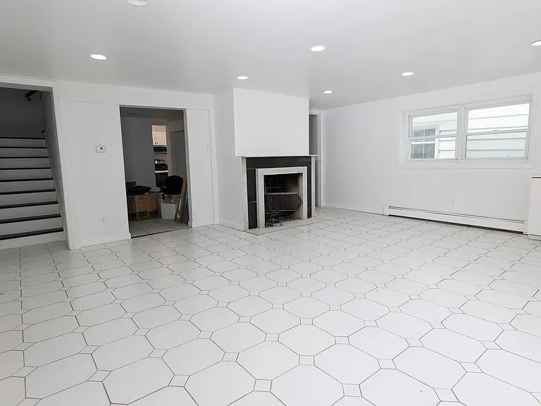Large living area with plenty of light.