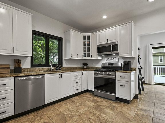 Updated Kitchen with granite counter tops and newer appliances