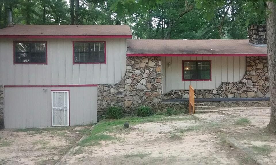 Tri-level home - Entry into living room, upstairs 3 bedrooms and 2 baths, downstairs, family room, bedroom, bath, walk-in closets, laundry room.