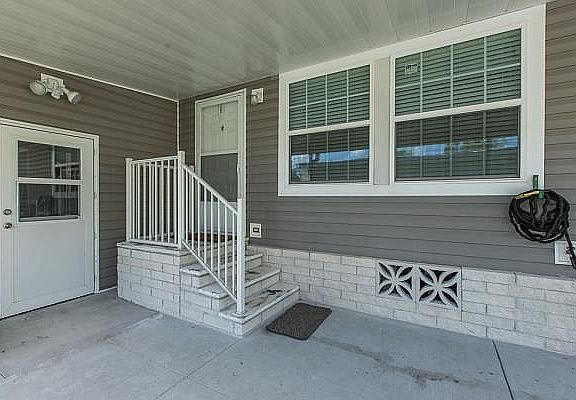 FRONT ENTRANCE AND SHOP DOOR