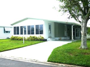 931 Periwinkle Cir, Barefoot Bay, FL 32976