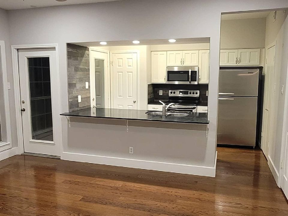 Entry and Livingroom into Kitchen (Main Patio Door)
