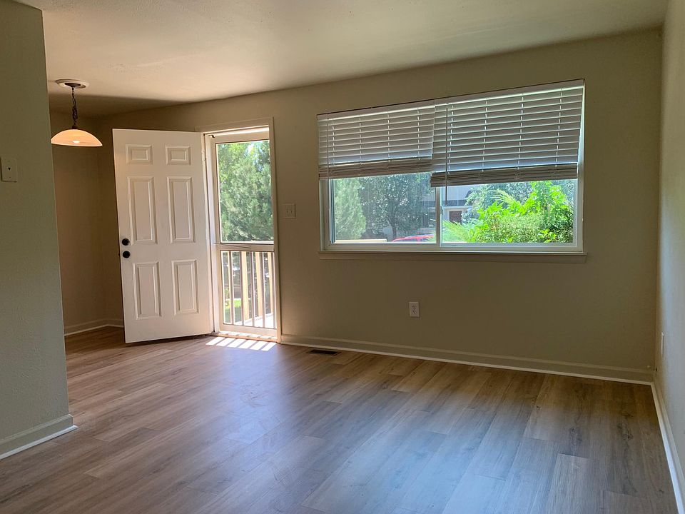 Living Room View to Large Window; new flooring