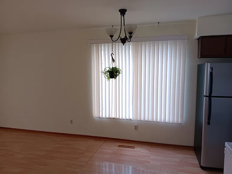 Large dining, LED lights (clean paint), large windows with large private backyard and private garage access.