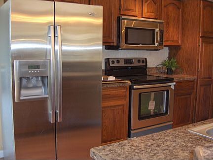 Stainless steel appliances in this step-saving kitchen.