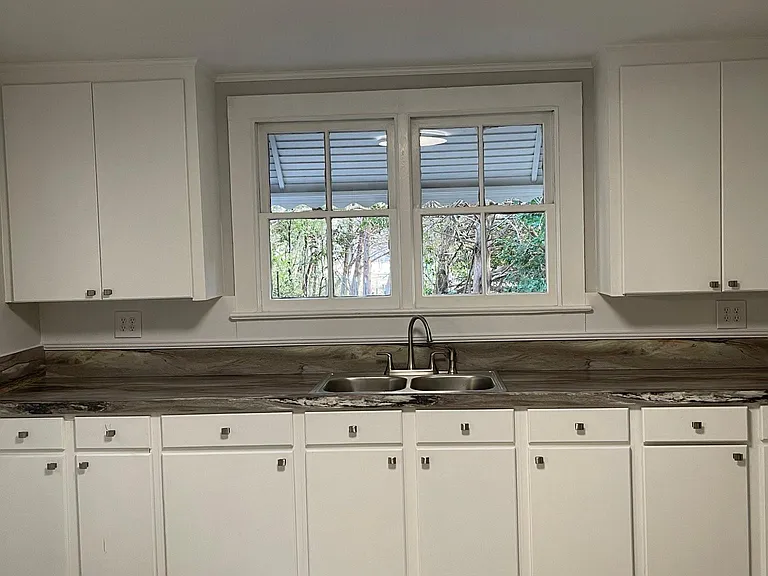 Kitchen with new countertops and some new cabinets