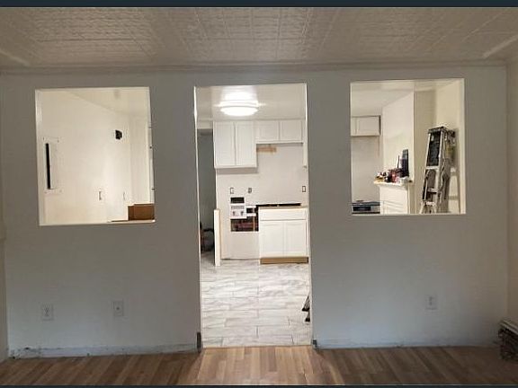 Living room looking into kitchen