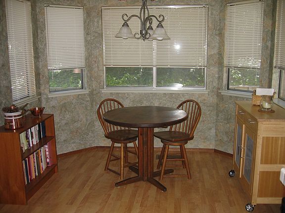 Spacious Eat-In Kitchen overlooks Backyard