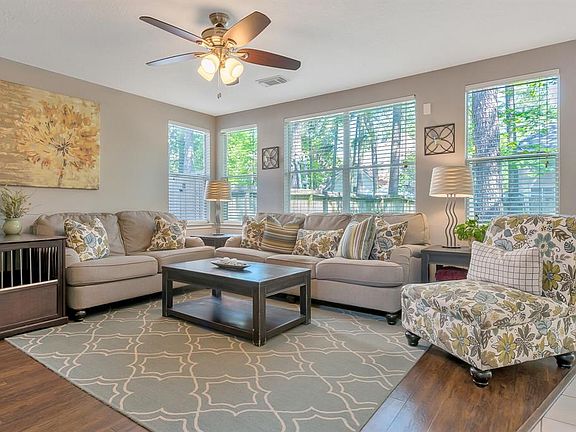The Family Room is cozy and inviting with outdoor views and durable laminate floors that have a hand scraped wood look and are low maintenance.
