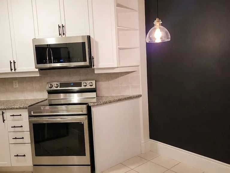 80 Harrison Garden Blvd #116 — Photo 7