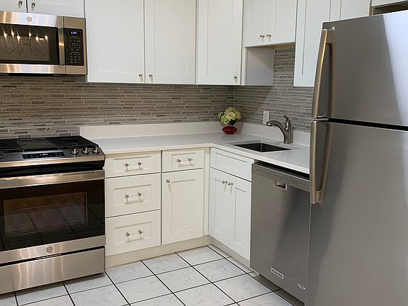 Recently renovated kitchen with lots of storage space.