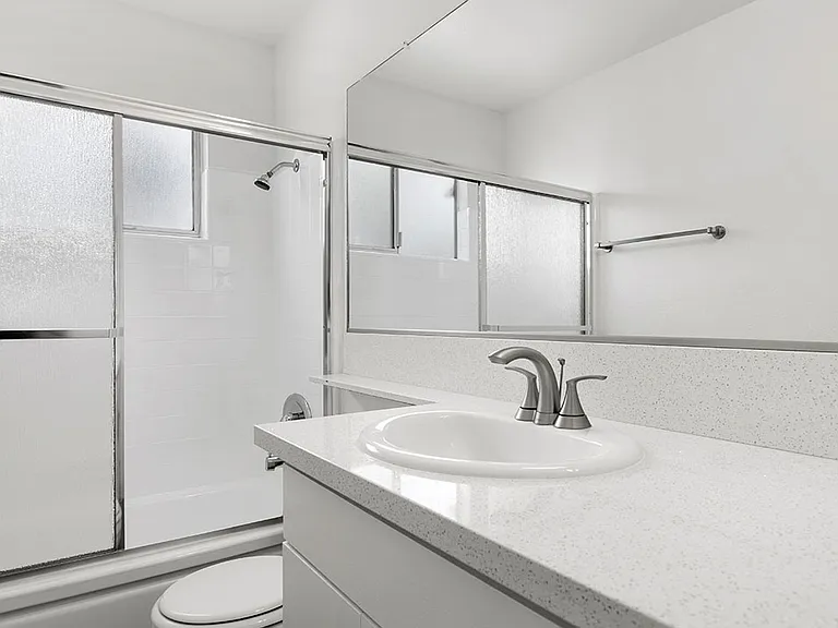 Modern styled bathroom with shower and tub.