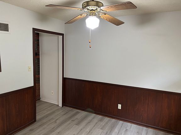 Dining Room with ceiling fan.