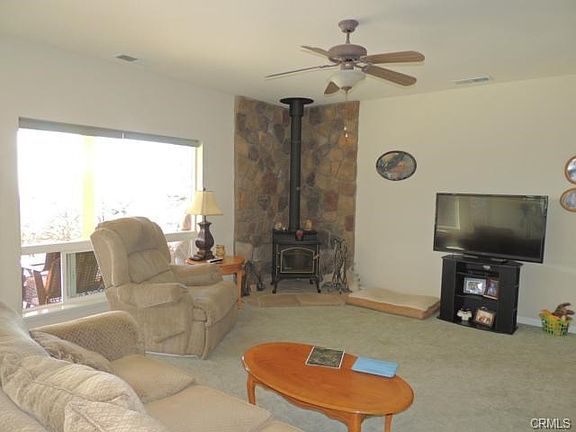 Right side of Great Room with wood burning stove.