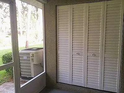 Enclosed Patio with large storage closet.